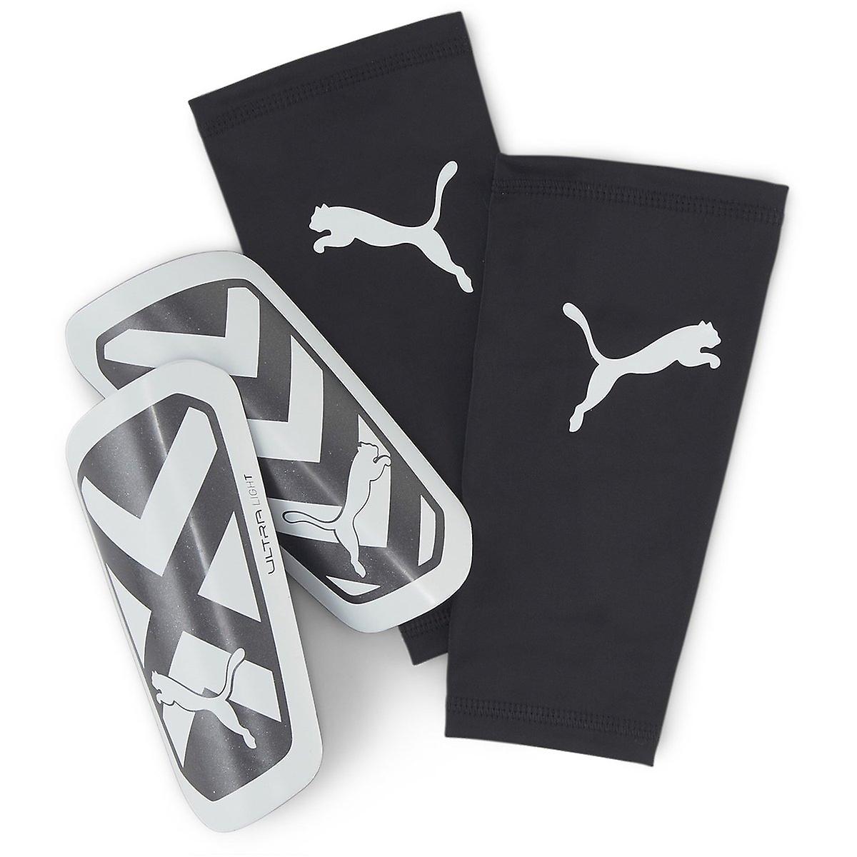 Puma Ultra Light Sleeve Shinguard-Black/White product image 1, provided for visual reference and product detail review