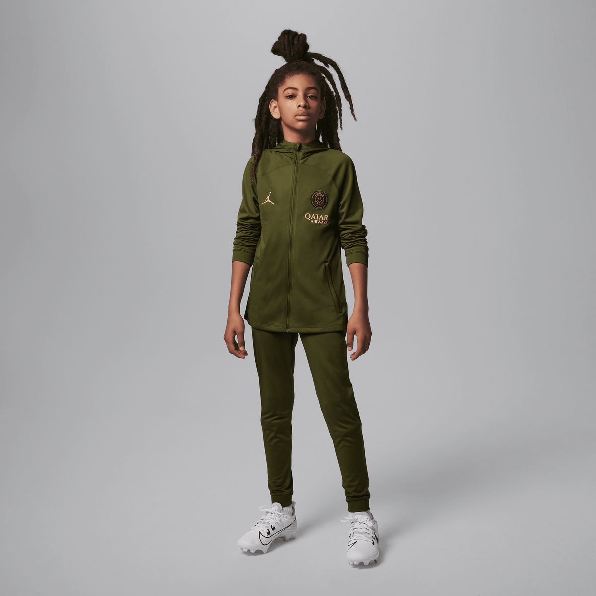 Nike PSG Strike Fourth Big Kids' Jordan Dri-FIT Soccer Hooded Knit Tracksuit product image 1, provided for visual reference